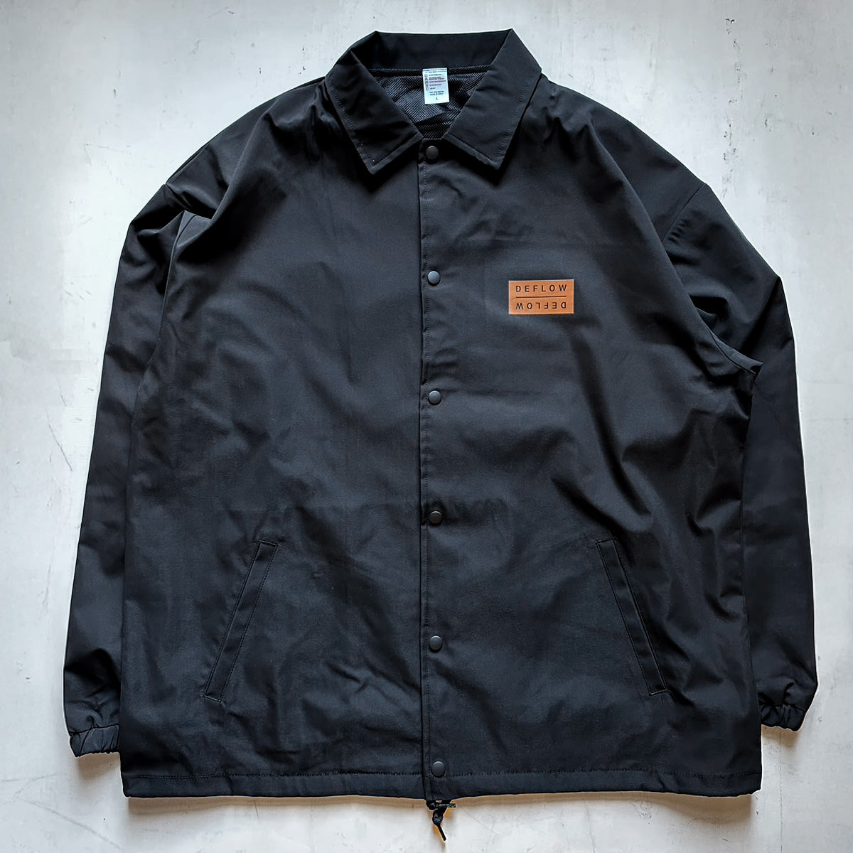 DEFLOW COACH JACKET BLACK